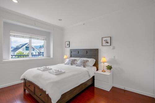 Ένα ή περισσότερα κρεβάτια σε δωμάτιο στο Central Spacious 3 Br Upstairs