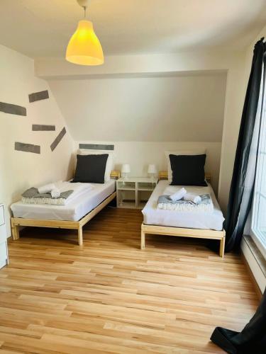 Katil atau katil-katil dalam bilik di Spacious Apartment for 6