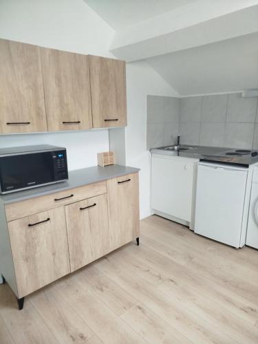 Køkken eller tekøkken på Petit nid Dacquois