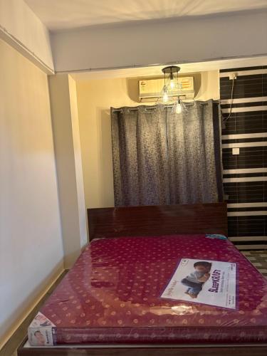 Postel nebo postele na pokoji v ubytování Pandora Homestay