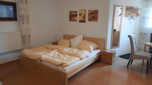 Postel nebo postele na pokoji v ubytování Einliegerwohnung in Künzell