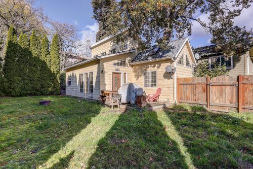 a house with a fence in the yard at Pet Friendly Waveseeker Private Yard in White Salmon