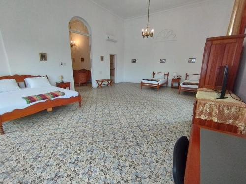 Кровать или кровати в номере Casa Morey