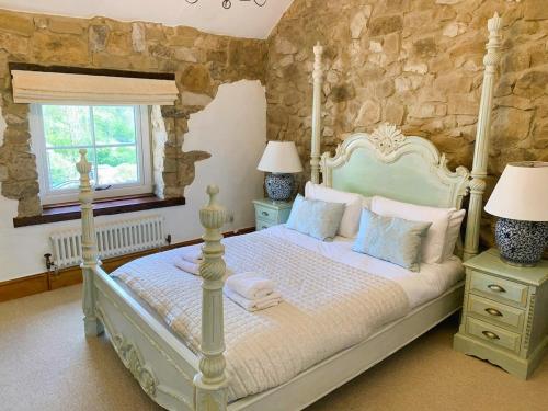 Voodi või voodid majutusasutuse #60 Peak District 3BR 3 Bath Cottage wParking toas