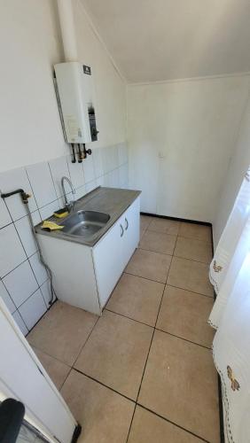 Køkken eller tekøkken på Cabaña Bosques de Santa Elvira