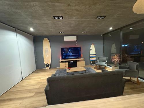 Una televisión o centro de entretenimiento en Casa las lomas