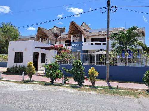 a house on the side of the street at Hotel Maria Maria in Bacalar