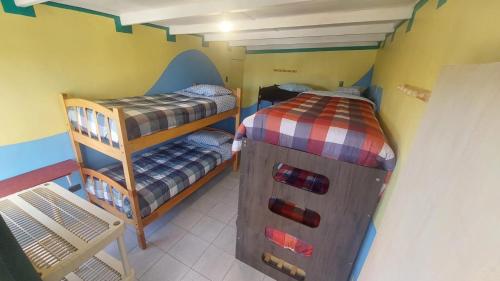 Ένα ή περισσότερα κρεβάτια σε δωμάτιο στο La Casa EcoExplor