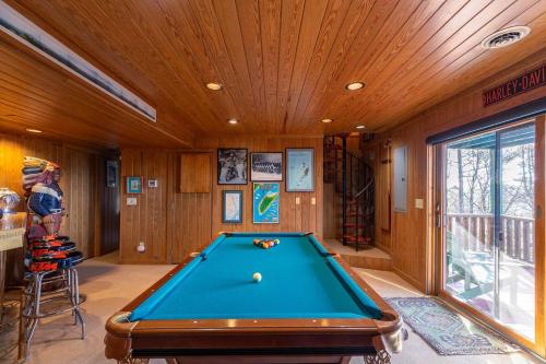 a pool table in a room with a ceiling at On Any Sunday in Blowing Rock