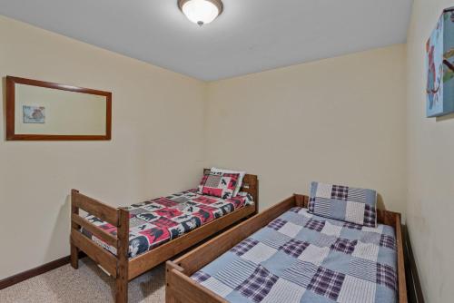 Ένα ή περισσότερα κρεβάτια σε δωμάτιο στο Banner Elk Lodge