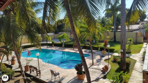 Swimmingpoolen hos eller tæt på Loft Rústico com Vista Para a Piscina