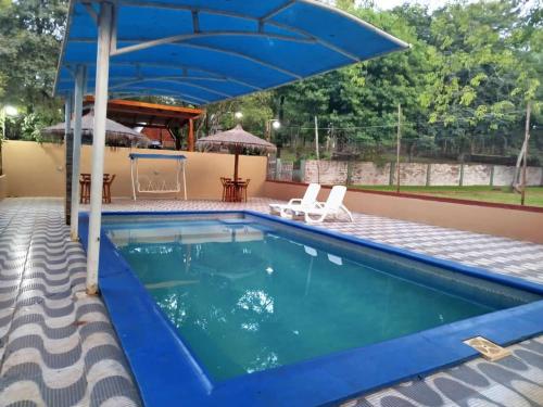Piscina a Glamping Guavirá o a prop
