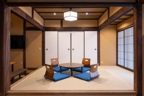 Giường trong phòng chung tại Temple Stay Kan