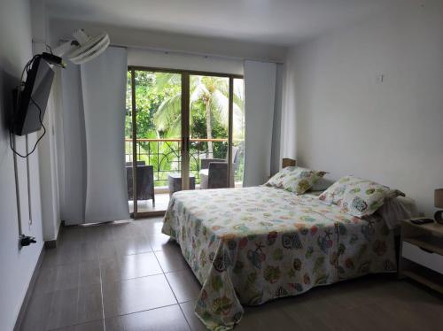 Postel nebo postele na pokoji v ubytování Apartamento duplex frente al mar con playa privada
