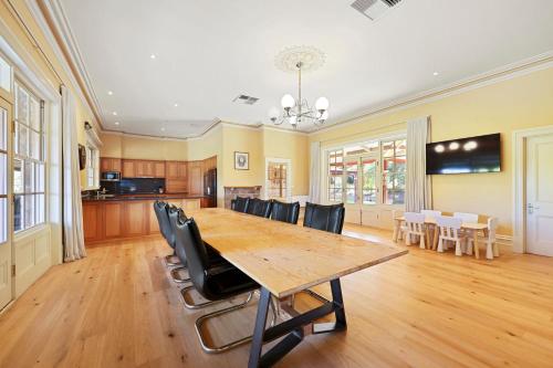 a large dining room with a table and chairs at Cornhill - Merrijig - Sleeps 12 in Merrijig