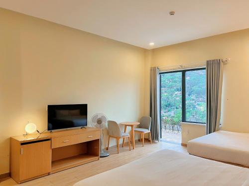 Gold View Boutique Hotel Đà Lạtにあるベッド