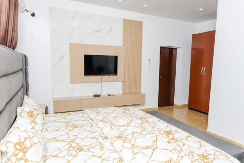 TV a/nebo společenská místnost v ubytování Vistastay Lekki