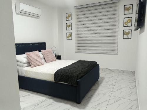 Katil atau katil-katil dalam bilik di Hermoso Apartamento ven de trabajo o turismo te va a encantar