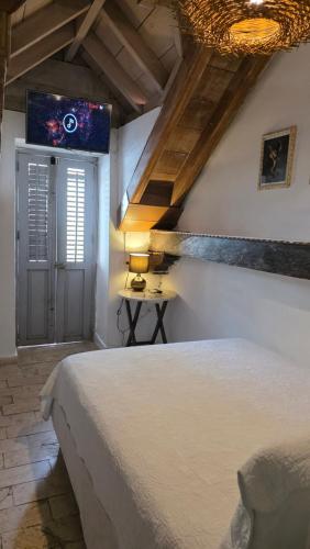 Voodi või voodid majutusasutuse Hotel Casa la Tablada toas
