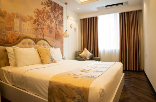 Postel nebo postele na pokoji v ubytování Mango Hotel - Ha Noi Railway station