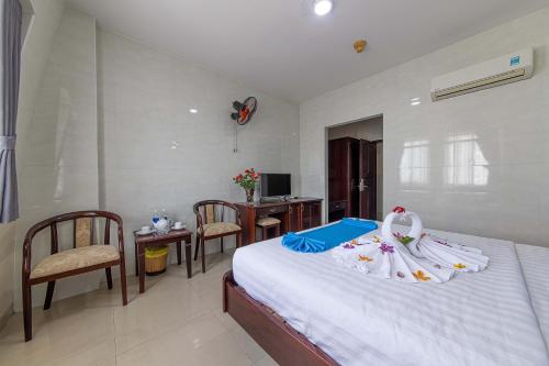 Phong Lan 2 Hotelにあるベッド
