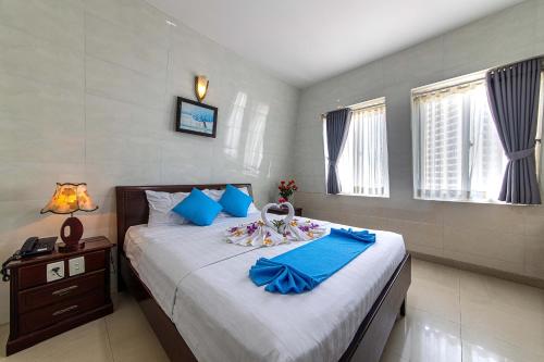 Phong Lan 2 Hotelにあるベッド
