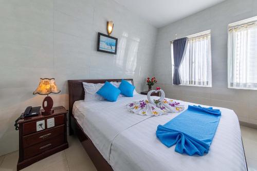 Phong Lan 2 Hotelにあるベッド