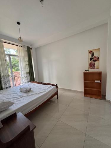 Postel nebo postele na pokoji v ubytování Meows homestay