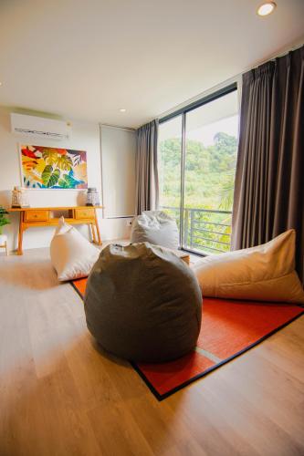 a living room with a large bean bag on the floor at Villa Kanya Aonang in Ao Nang 