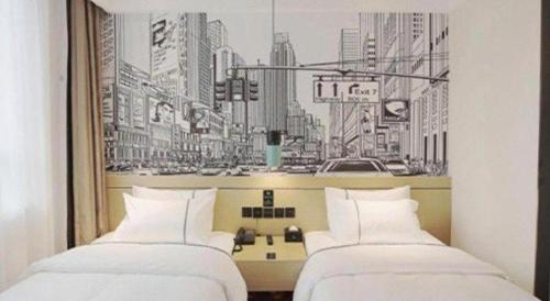 Letto o letti in una camera di City Comfort Inn Jinan West Station Shandong International Convention and Exhibition