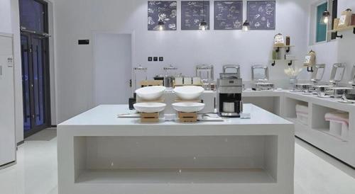 Cucina o angolo cottura di City Comfort Inn Jinan West Station Shandong International Convention and Exhibition