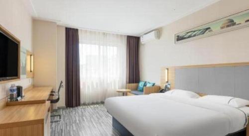 Letto o letti in una camera di City Comfort Inn Hotel Guilin Hongling Road