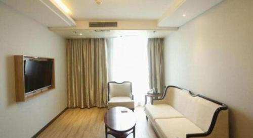 Μια τηλεόραση ή/και κέντρο ψυχαγωγίας στο GreenTree Inn Anqing Yingbin Dong Road High-Speed Railway Station