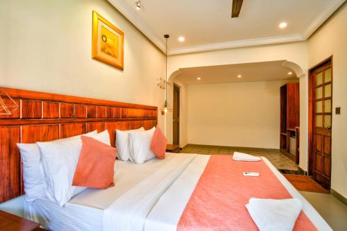 Dimaru Boutique Hotelにあるベッド