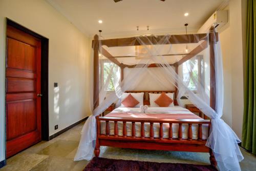 Dimaru Boutique Hotelにあるベッド