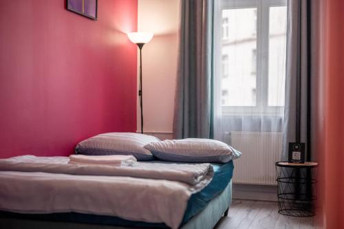 Ένα ή περισσότερα κρεβάτια σε δωμάτιο στο VICE CITY Hostel