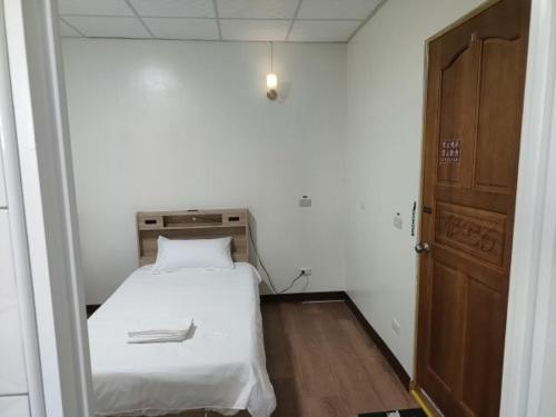 Postel nebo postele na pokoji v ubytování 豐濱客棧 Fakong Guest House