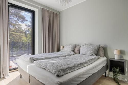 Postel nebo postele na pokoji v ubytování Exklusiv villa - Pool, bio & hyrbil