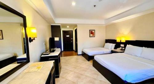 Кровать или кровати в номере MO2 Westown Hotel San Juan