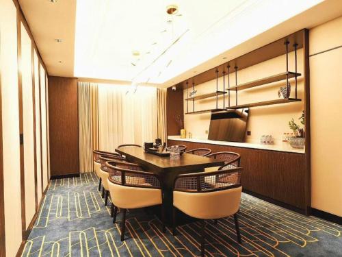 Posezení v ubytování Jinjiang Metropolo Shaoxing Keqiao Wanda Plaza