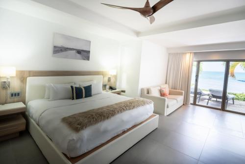 Кровать или кровати в номере Hodges Bay Resort & Spa, an HQ Luxury Resort & Residences