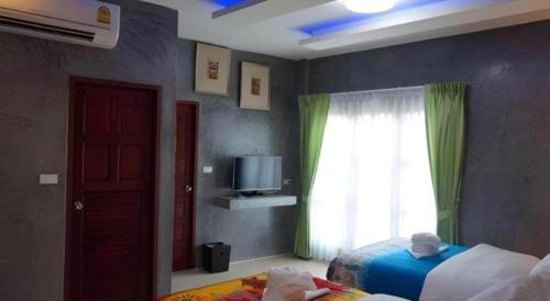 Letto o letti in una camera di Saikaew Boutique Hotel