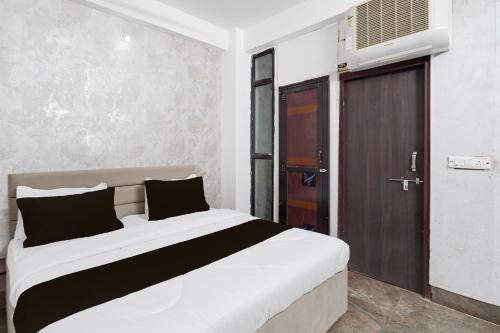 Katil atau katil-katil dalam bilik di Hotel O City Park Kota Formerly Oxyluxe