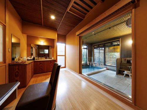 Kuchyň nebo kuchyňský kout v ubytování Oiwakeya Ryokan