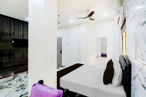 OYO 83814 Hotel Yash Residencyにあるベッド