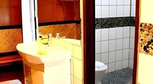 Ванная комната в Orator Hotel