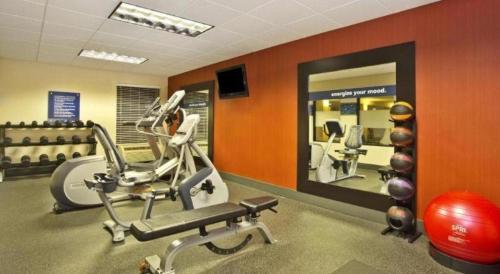 a gym with cardio equipment and a gym at Hampton Inn Anderson in Anderson