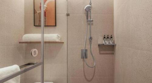 Un baño de Home Inns Plus Shanghai Xujiahui Branch