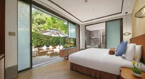 Postel nebo postele na pokoji v ubytování Fliport Hotel Zhangzhou Yuanshan