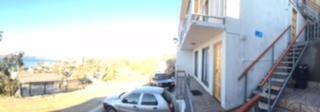 a car parked outside of a building next to a building at Don Felix in Coquimbo